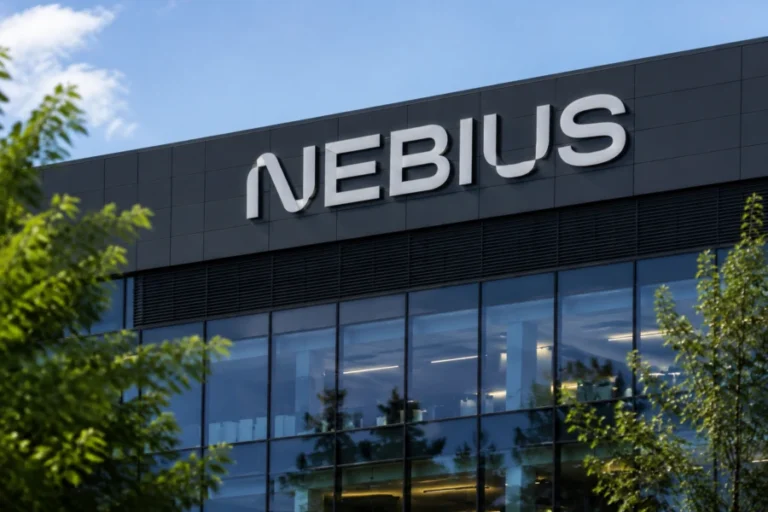 Nebius Group headquarters building exterior with illuminated logo signage, Amsterdam